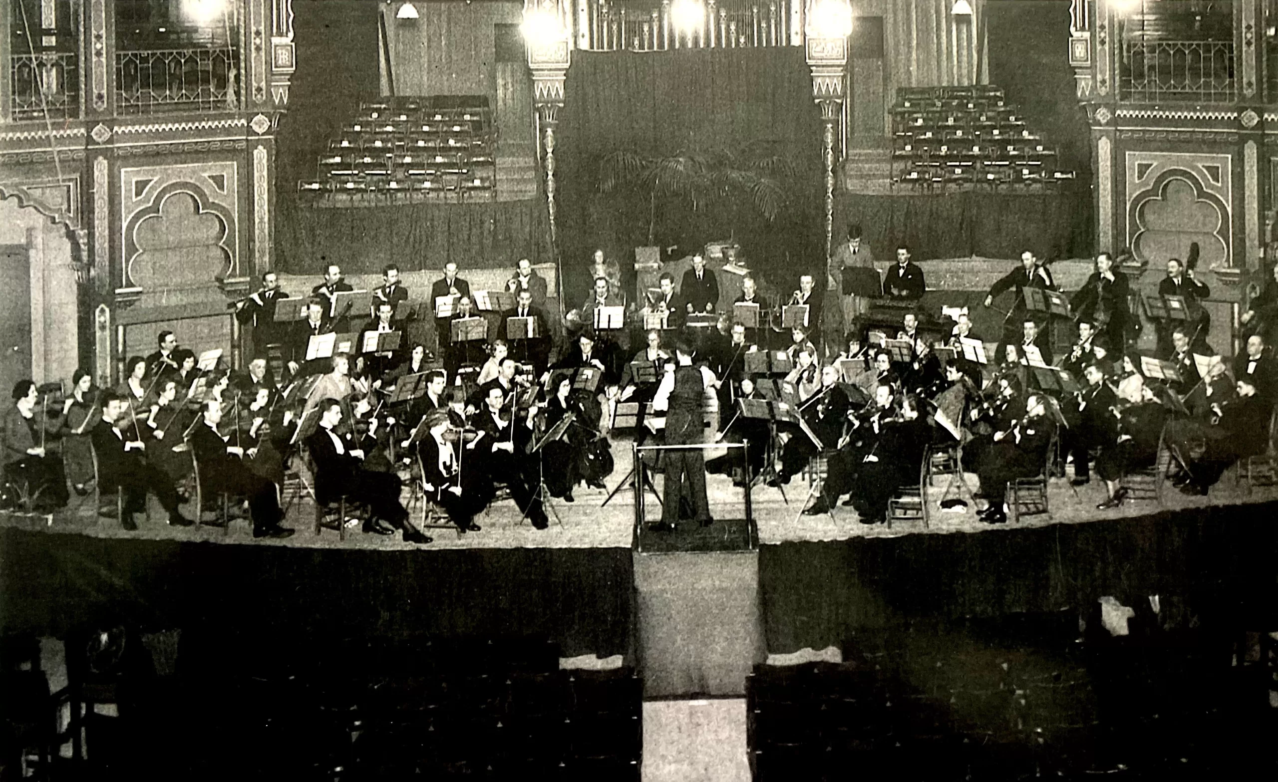 Sepia image of BPO performing in Brighton Dome Concert Hall (pre-refurb)